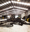 Large warehouse with fishing nets on the floor